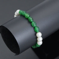 6x9mm Oval Jade with 8mm Round MOP Stretchy Bracelet, Sku#EF702