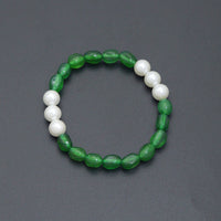 6x9mm Oval Jade with 8mm Round MOP Stretchy Bracelet, Sku#EF702