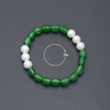 6x9mm Oval Jade with 8mm Round MOP Stretchy Bracelet, Sku#EF702