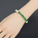 6x9mm Oval Jade with 8mm Round MOP Stretchy Bracelet, Sku#EF702